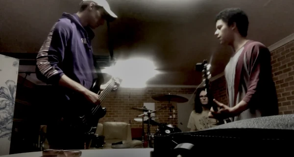 The band jamming in a garage